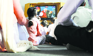 Students of a government school watch the live telecast of Mars Orbiter Mission in Ludhiana.