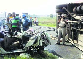 Mangled remains of the car, which met with an accident on the Amritsar-Batala bypass road in Amritsar on Thursday