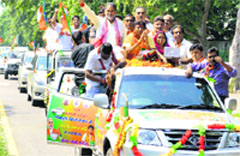 BJP candidate for the Panchkula Assembly seat Gian Chand Gupta during the roadshow before filing of nomination papers on Thursday. A Tribune photograph