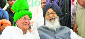 INLD chief Om Prakash Chautala shares a light moment with Punjab Chief Minister Parkash Singh Badal 