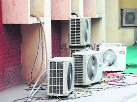 Temporary AC units installed outside the main auditorium at the Government College for Girls in Ludhiana. 