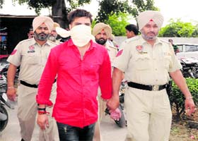 Lalit Kumar, notorious bootlegger, landed in the custody of the Chheharta police in Amrtisar on Friday