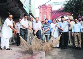 Mayor Bakshi Ram Arora, MC Commissioner Pardeep Sabharwal and other officials at the launch of a cleanliness drive in Amritsar on Thursday
