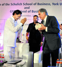 Telangana Chief Minister K Chandra Sekhar Rao presents a memento to industrialist Ratan Tata at the inauguration of the Schulich School of Business, York University and GMR School of Business at RGI Airport in Hyderabad on Friday.