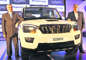 Pravin Shah (L), chief executive (Automotive Division & International Operations), Mahindra & Mahindra, and Marketing head Vivek Nayer at the launch of new generation Scorpio in New Delhi on Friday. It is priced at Rs 8.40 lakh onwards.