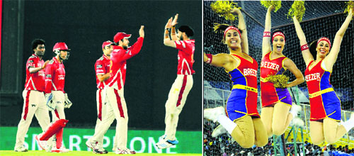 Players of Kings XI Punjab celebrate a wicket of Northern Knights during a CLT20 tie; and (right) cheer girls add spark to the proceedings at the PCA Stadium in Mohali on Friday.