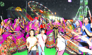 Girls perform dandia at the Diwali mela in Sector 34, Chandigarh.