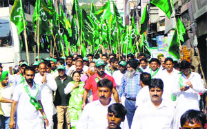 INLD supporters hold a rally in Kalka on Friday.