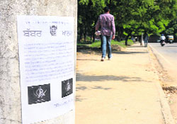 One of the posters pasted near the Sector 17 football stadium in Chandigarh on Friday. 
