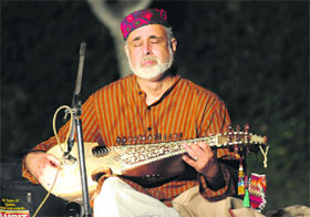 Sufi musician Ustad Dadu Khan Sadozai from Afghanistan plays Kabuli Rabab in Sector 5, Chandigarh, on Friday. 