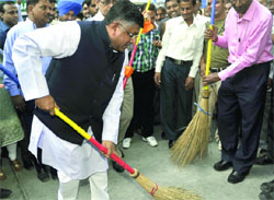 Union Minister for Communications & Information Technology and Law & Justice Ravi Shankar Prasad launches cleanliness drive in the premises of the Ministry of Law and Justice in New Delhi on Friday. Tribune photo