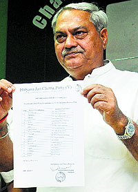 HJCP chief Venod Sharma releases the list of candidates in Chandigarh on Friday