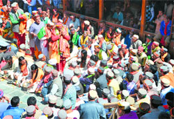 MLA Maheshwar Singh with representatives of deities during a Dev Sansad at Naggar near Kullu on Friday. Photo BY Correspondent