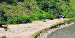 Illegal mining in progress at a riverside in Rohru, near Shimla. Photo: Amit Kanwar