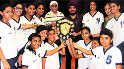 The Welham Girls School team with the trophy after winning the DDSCA Girls Under-15 Basketball Tournament in Dehradun on Friday
