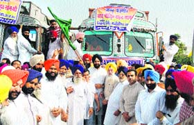 Bikram Singh Majithia flags off trucks loaded with relief material for Jammu and Kashmir in Amritsar on Saturday
