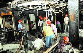 Workers clean the premises of Nectar Life Sciences Limited in Sector 9, Chandigarh, on Saturday. 