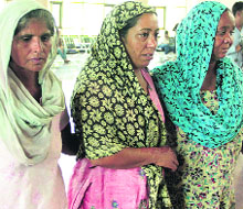 Kin of deceased security guard, Harmail Singh, at PIMS in Jalandhar on Saturday.