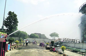 A mock drill for fire safety in progress at the Hindustan Petroleum Corporation in Jalandhar on Saturday. 