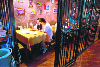The prison-style restaurant in Tianjin is aimed at reminding people to observe the law and to be good citizens. 