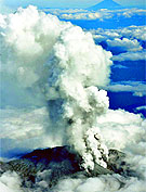 Smoke rises from Mount Ontake, the Japanese volcano that erupted on Saturday, injuring at least eight persons and forcing aircraft to divert their routes