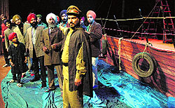 Artistes stage a play, Aag londi rahi samundra ch teriyan, during the Punjab Theatre Festival at Punjab Natshala in Amritsar on Sunday