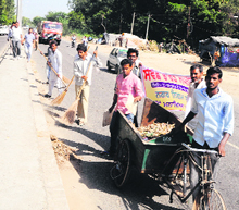 Safai karamcharis clean Goniana Road under the Swachh Bharat Abhiyan in Bathinda on Sunday.