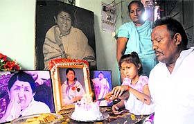 A family celebrates the birthday of melody queen Lata Mangeshkar at their residence in Sector 22. They have been celebrating the singer's birthday for the last 28 years.