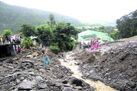 Devastation caused by reckless cutting of hills and unscientific mining by power companies at Deol village in Palampur