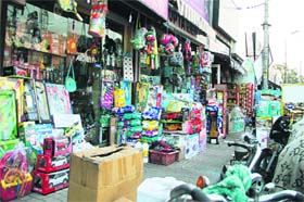 Shopkeepers have extended their shops on the pedestrians way at Ladowali Road market preventing them from walking in Jalandhar