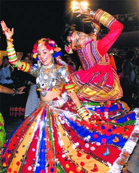 Artistes perform garba during the Navratri festival in Mumbai