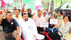 UKD party workers hold a protest in support of their demands at Deen Dayal Upadhyay Park in Dehrdaun on Saturday