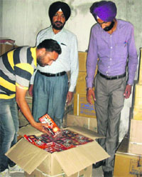Officials show firecrackers seized from an illegal store in Amritsar.