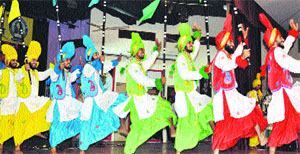 Students present bhangra at the Youth Festival at GNDU, in Amritsar on Monday.