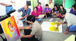 Artistes take part in a workshop on fine arts at Post Graduate Government College, Sector 46, Chandigarh, on Monday