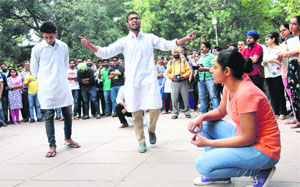 A street play being performed by the Students for Society to commemmorate the 108th birth anniversary of Shaheed Bhagat Singh at the PU on Monday.
