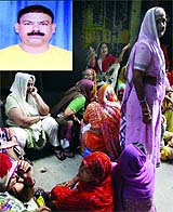 Relatives mourn death of Ishwar Lal (inset) in Karol Bagh on Monday. 
