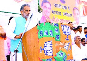 Union Minister Krishan Pal Singh Gurjar addresses a gathering at Sikandarpur village in Jhajjar