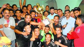 Winners of the football tournament in Mandi on Monday