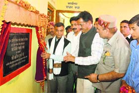 Rural Development and Panchayati Raj Minister Anil Sharma (extreme left) inaugurates the Panchayat Bhavan at Ratocha village in Manikaran valley of Kullu district on Monday