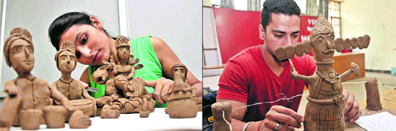Students participate in the clay modelling competition during the Display Your Talent event at the University of Jammu on Monday.
