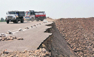 A portion of the road near the fourth Tawi bridge is still in a bad condition after it was damaged in the recent floods in Jammu.
