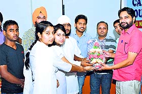 Head and students of the Music Department present a bouquet to Prof Shamshad Ali from ASSM College, Mukandpur, at GNN College in Doraha on Monday.