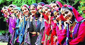 Drama artistes from the PAU enact a scene from a play; and (left) students strike a pose before presenting Sammi at a function in Pal Auditorium in Ludhiana. 
