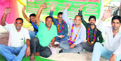 Members of the MP Ed and BP Ed Trained Association protest in support of their demand in Dehradun on Monday. A Tribune photograph