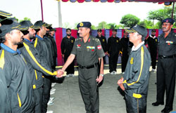 Brigadier Hari Singh with members of the trekking team during a function in Bathinda on Tuesday. Tribune photo