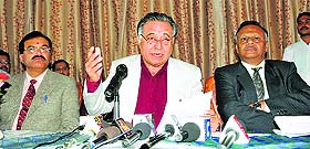 Transport Minister GS Bali addresses mediapersons in Shimla on Tuesday.