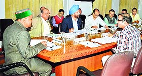 Forest Minister Thakur Singh Bharmouri presides over a meeting of BoD HP State Forest Development Ltd in Shimla on Tuesday.