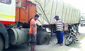 Tyres of a huge cement-laiden truck were stuck in an open manhole near the ESI hospital in Jalandhar on Tuesday. 