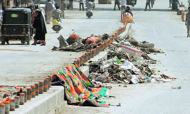 A file photo of garbage littered on a road in Srinagar.